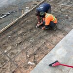 Project 14530 - construction worker building the floor